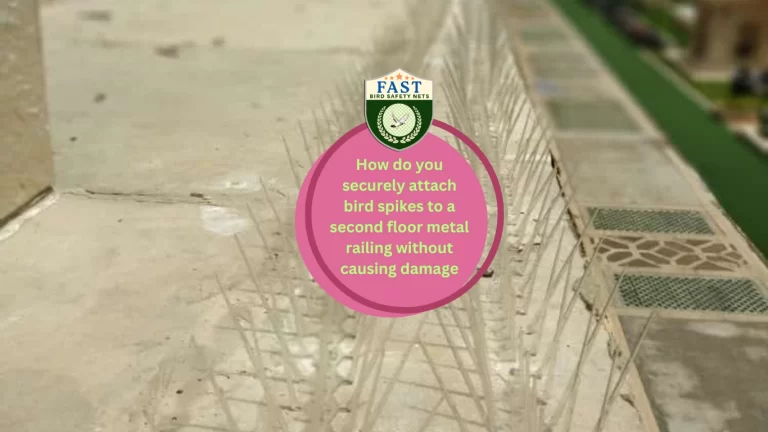 How do you securely attach bird spikes to a second floor metal railing without causing damage?